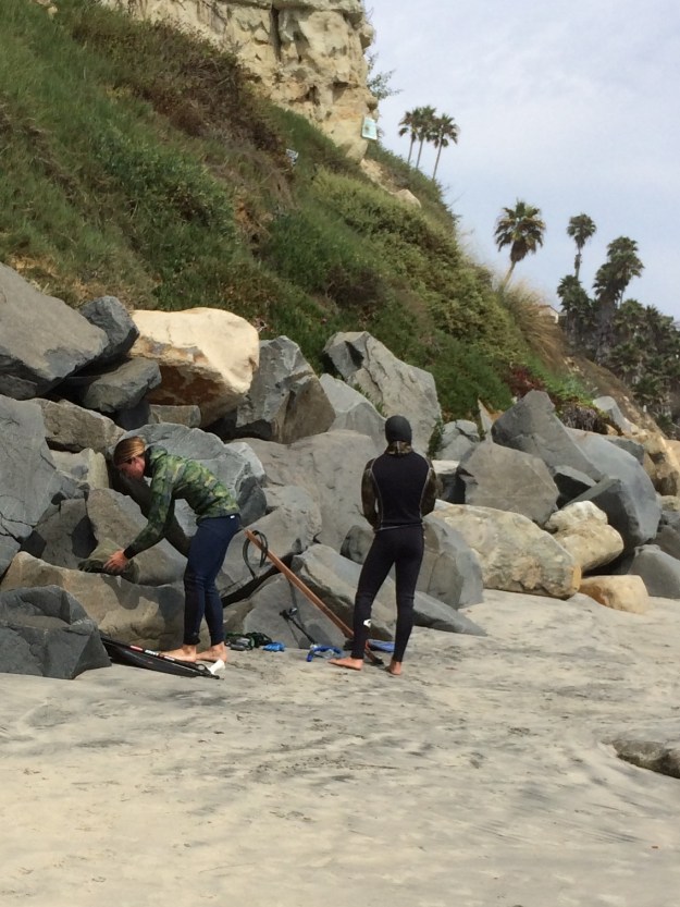 beach people-spear fishers